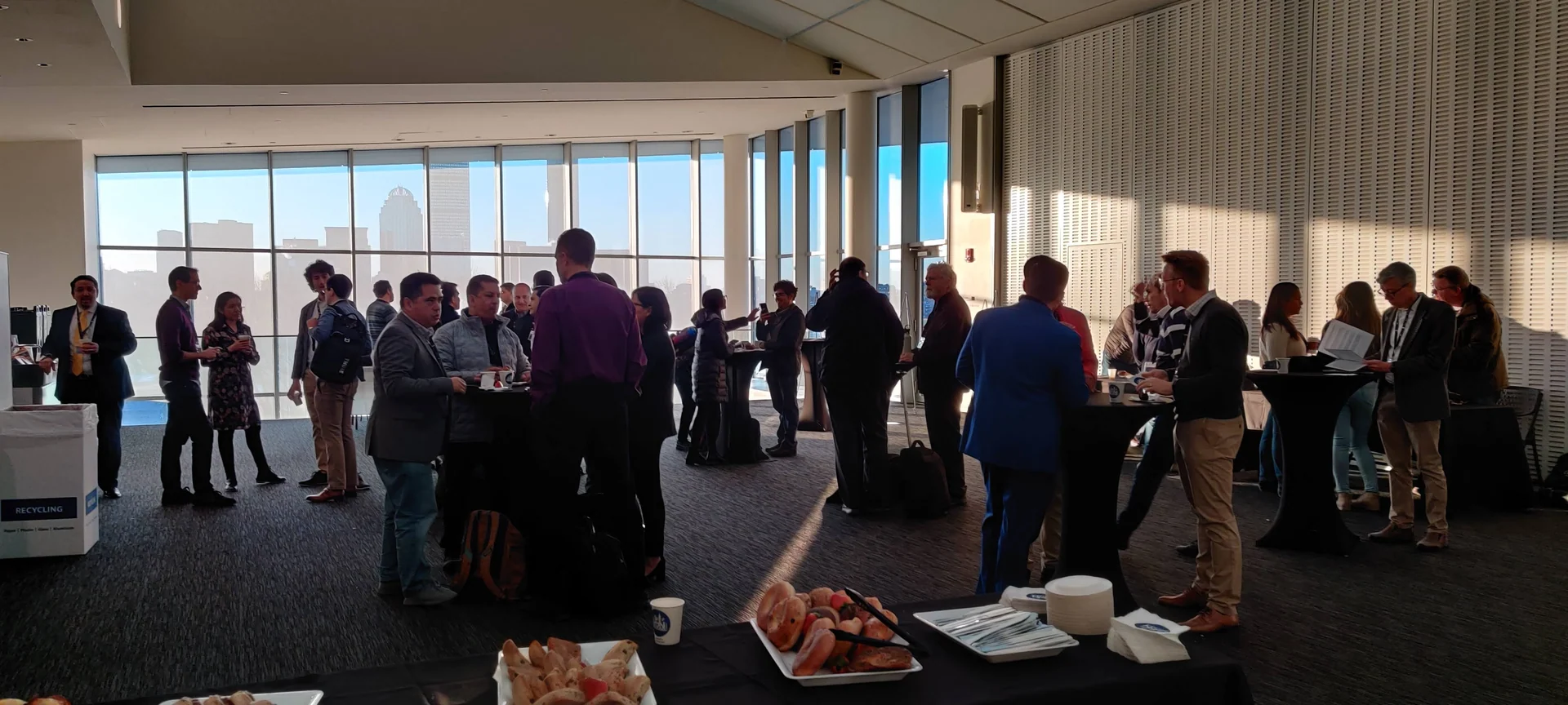 Attendees gather in the MIT Media Lab atrium before a session at the AI Latin American SumMIT, January 21, 2020.