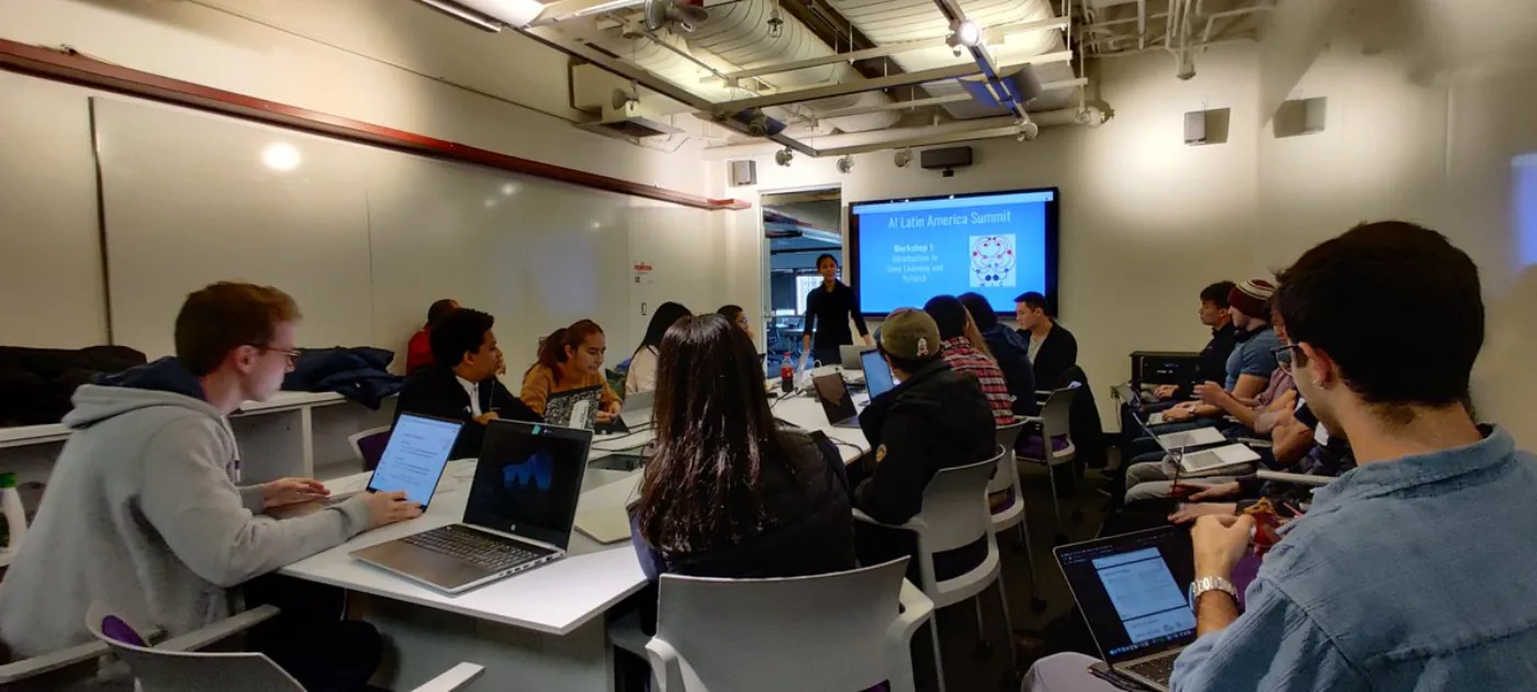 Participants follow a deep-learning workshop during the AI Latin American SumMIT Hackathon at MIT Media Lab.