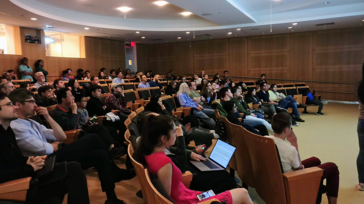 Audience members listen during the Cambridge Science Festival program on artificial intelligence and neuroscience at the Massachusetts Institute of Technology.