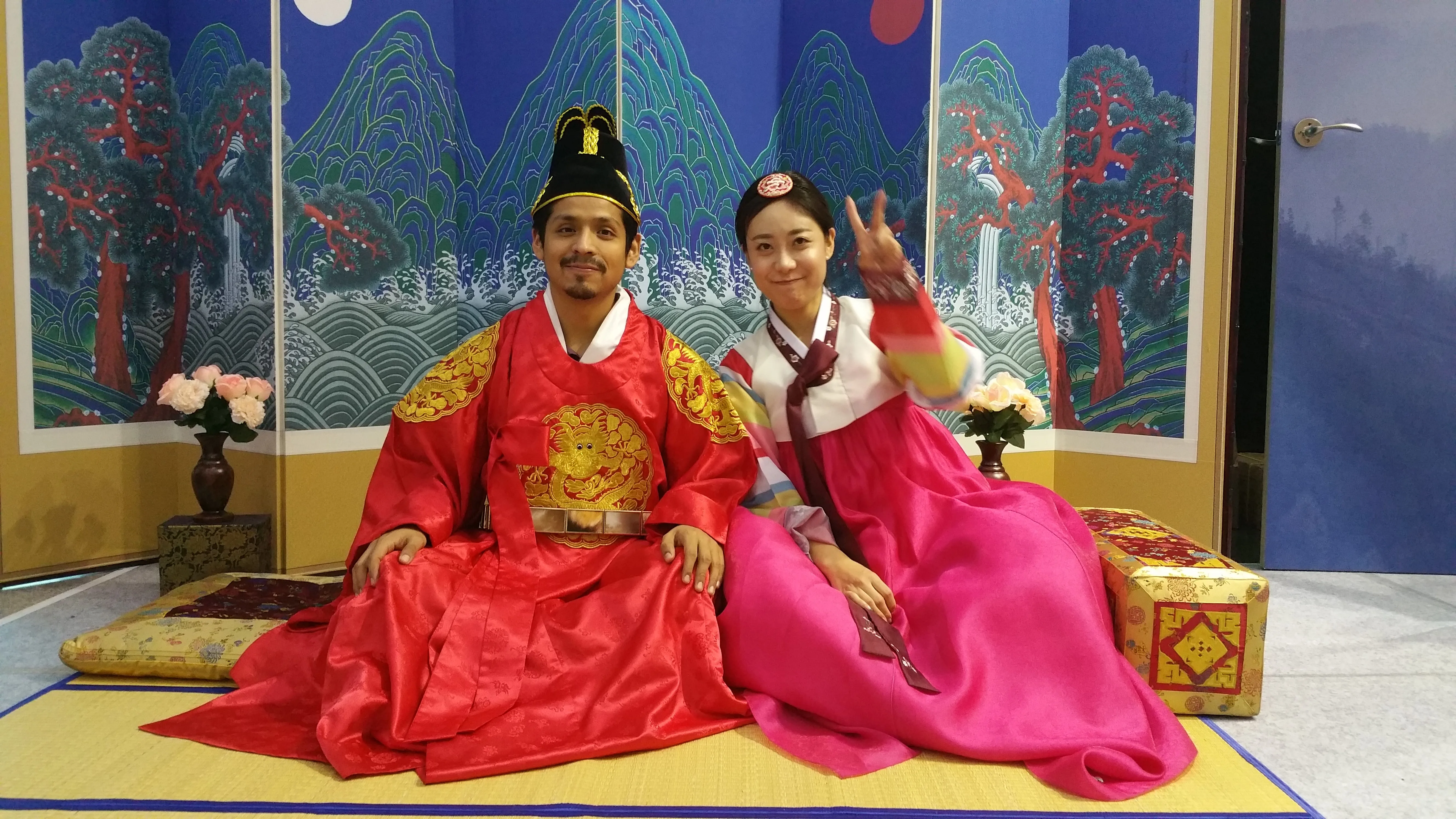 Dr. Omar Costilla Reyes and a fellow attendee wearing traditional Korean clothing at BEXCO in Busan, South Korea, on November 3, 2015.