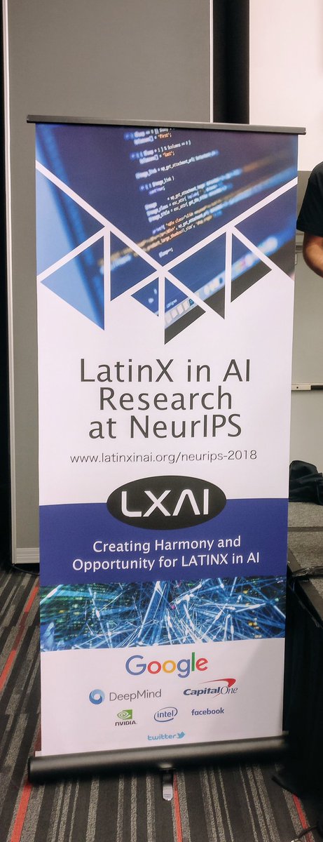 Roll-up banner reading LatinX in AI Research at NeurIPS, with the LXAI logo, the line Creating Harmony and Opportunity for LATINX in AI, and sponsor logos.
