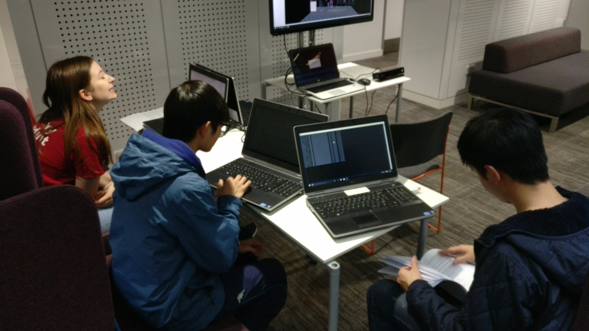 Participants work with laptops during the University of Manchester DigiLab workshop.