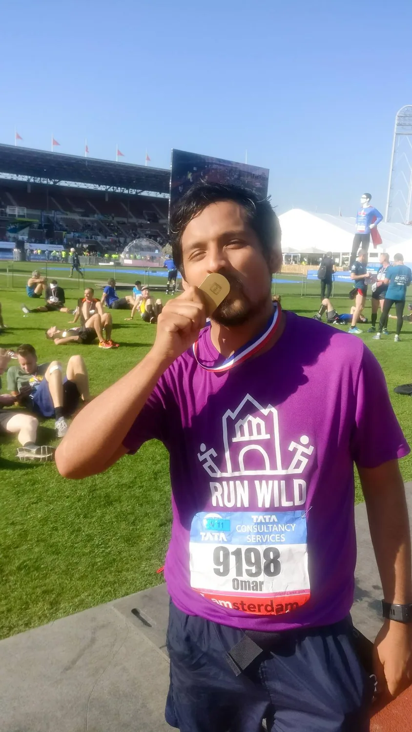 After finishing the Amsterdam Marathon in 2017.