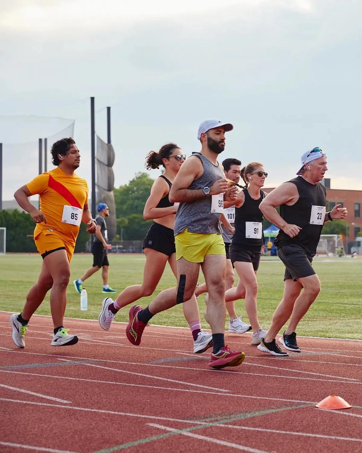 Running on a track during a Boston running week in 2023.