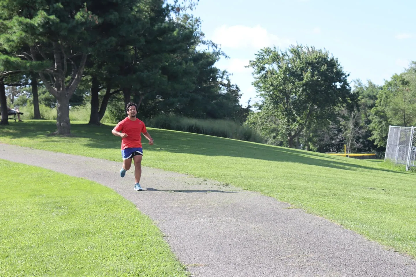 Running during a 100th parkrun celebration in 2023.